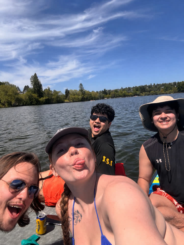 A selfie with Dom and Lei, paddleboarding on Green Lake